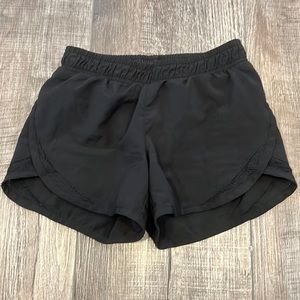 Old Navy Dolphin hem running shorts built in brief liner orig. $15. Like new